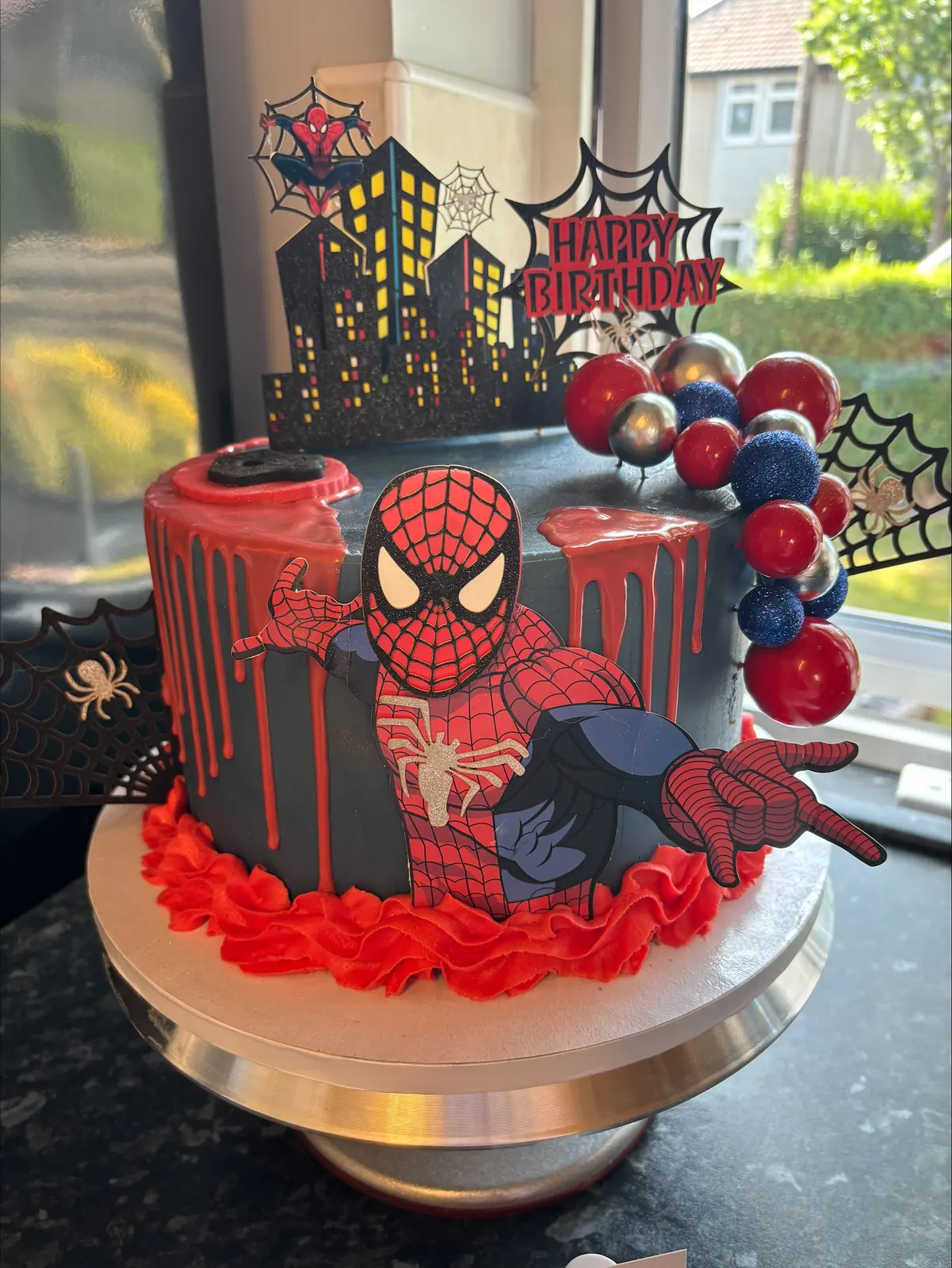 Spiderman web city cake